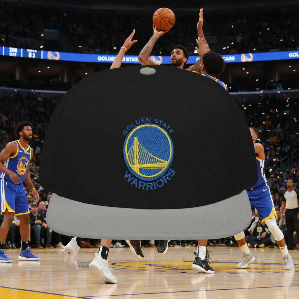Basketball game with a large Golden State Warriors logo 